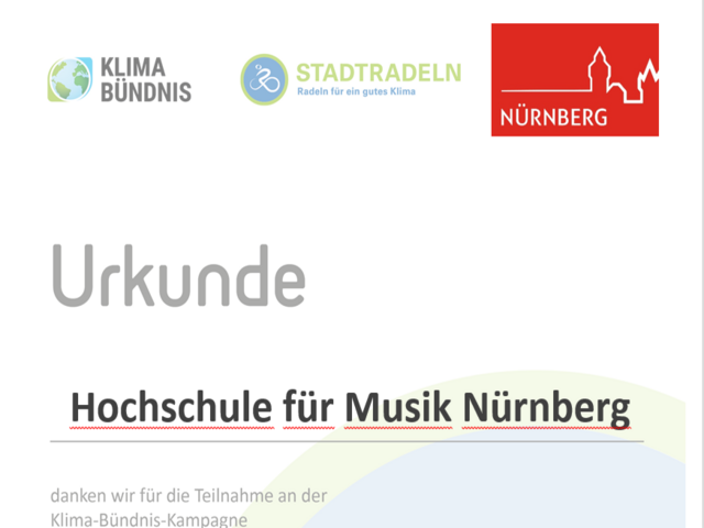 Text; Urkunde Der Hochschule für Musik Nürnberg danken wir für die Teilnahme an der Klima-Bündnis-Kampagne. Oben Logos Klima Bündnis, Stadtradeln und Stadt Nürnberg